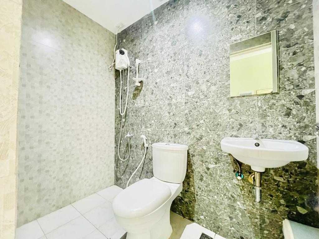 Oyo 1008 Armond Bed And Breakfast 麦克坦 外观 照片
